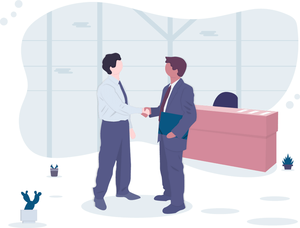 Two business people shaking hands in front of a desk